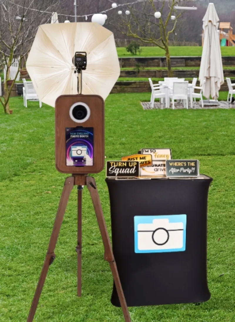 Flashback photo booth with vintage red oak wood exterior and touchscreen